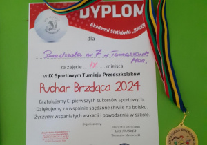 Dyplom i medal za udział w zawodach sportowych