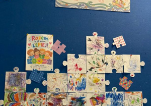 Praca plastyczna składająca się z puzzli wykonanych przez najmłodsze dzieci